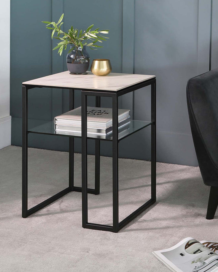 A modern side table with a light marble top, black frame, glass shelf, and minimalist decor, sitting on a soft carpet.