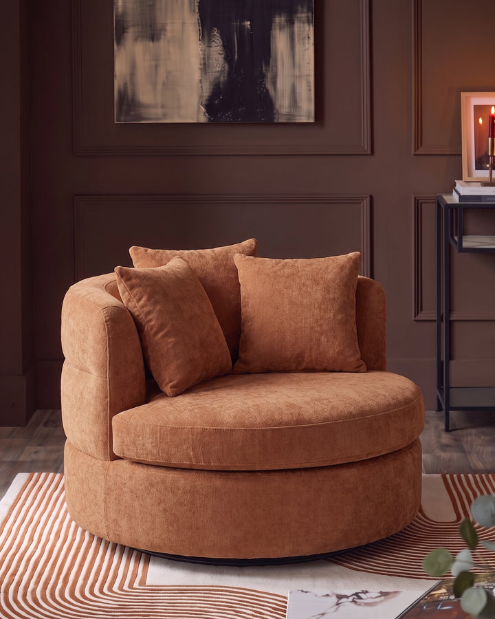 Gwen apricot chenille swivel armchair
