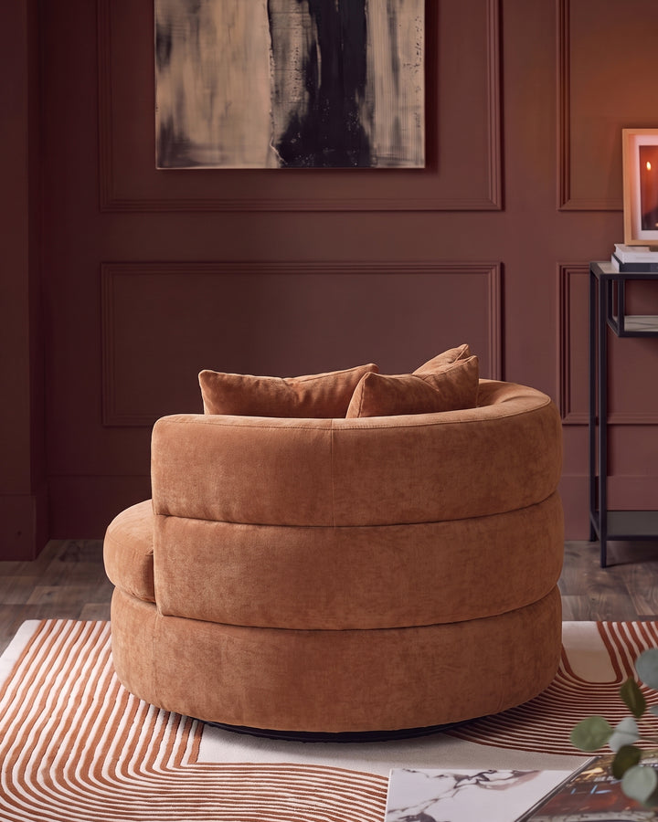 Gwen apricot chenille swivel armchair