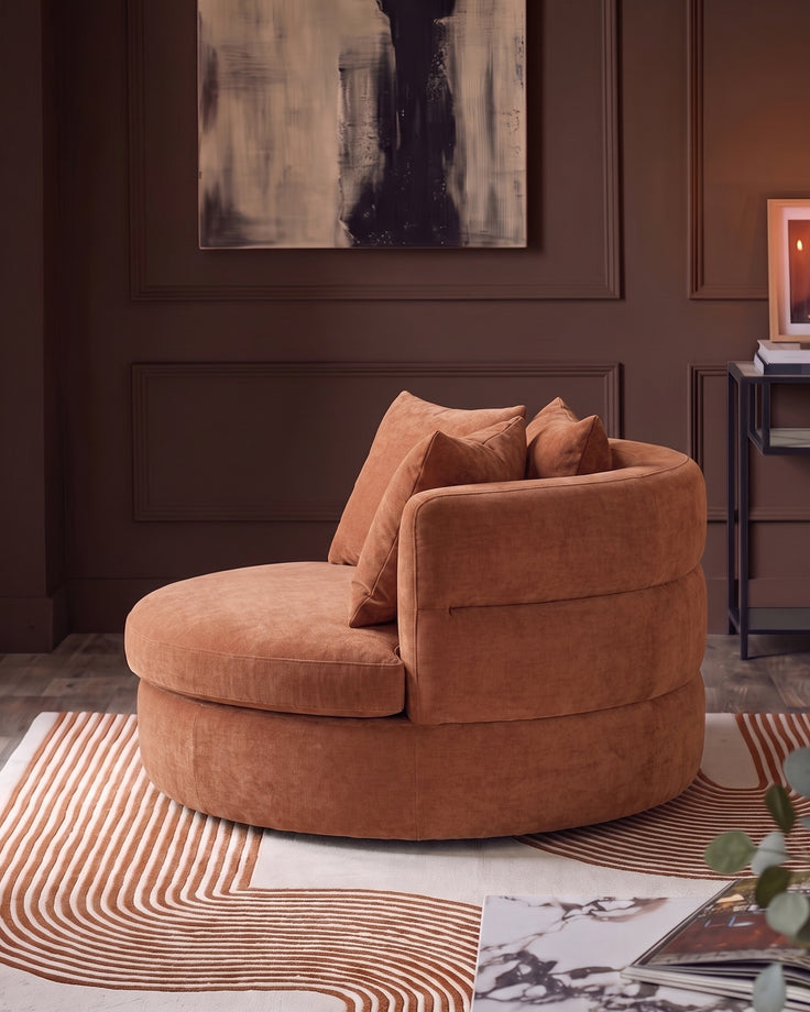 Gwen apricot chenille swivel armchair
