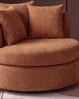 Gwen apricot chenille swivel armchair