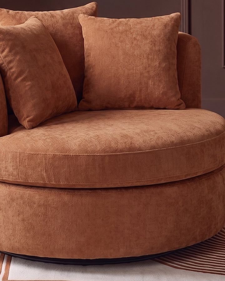 Gwen apricot chenille swivel armchair