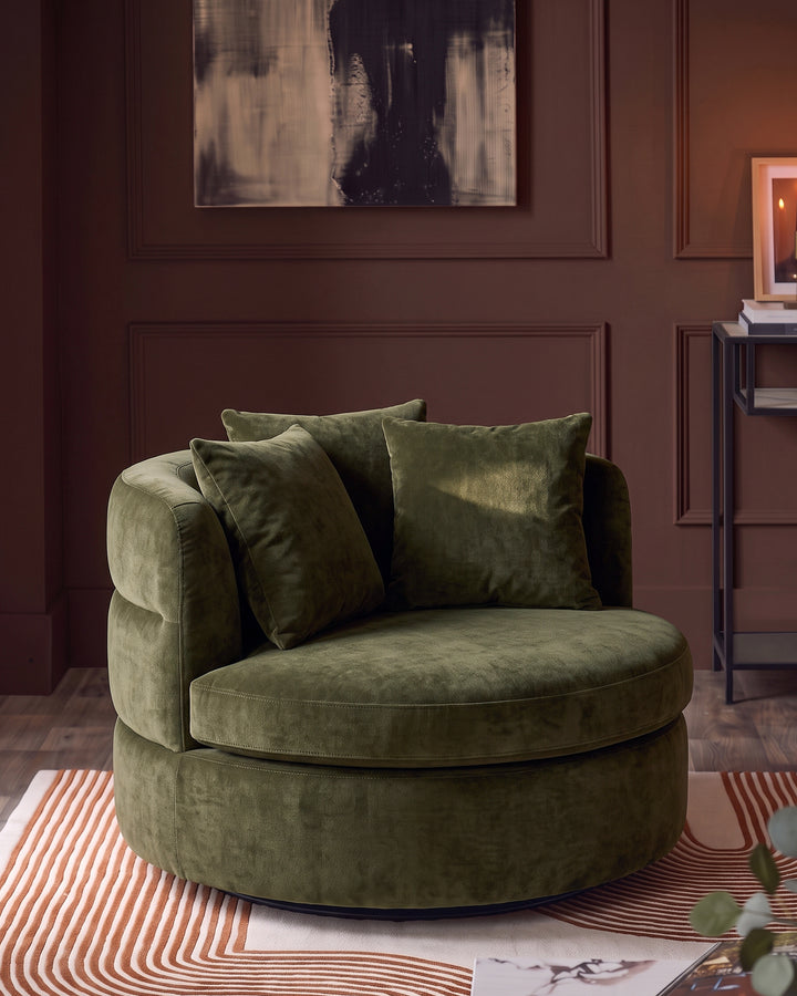 Gwen dark green chenille swivel armchair