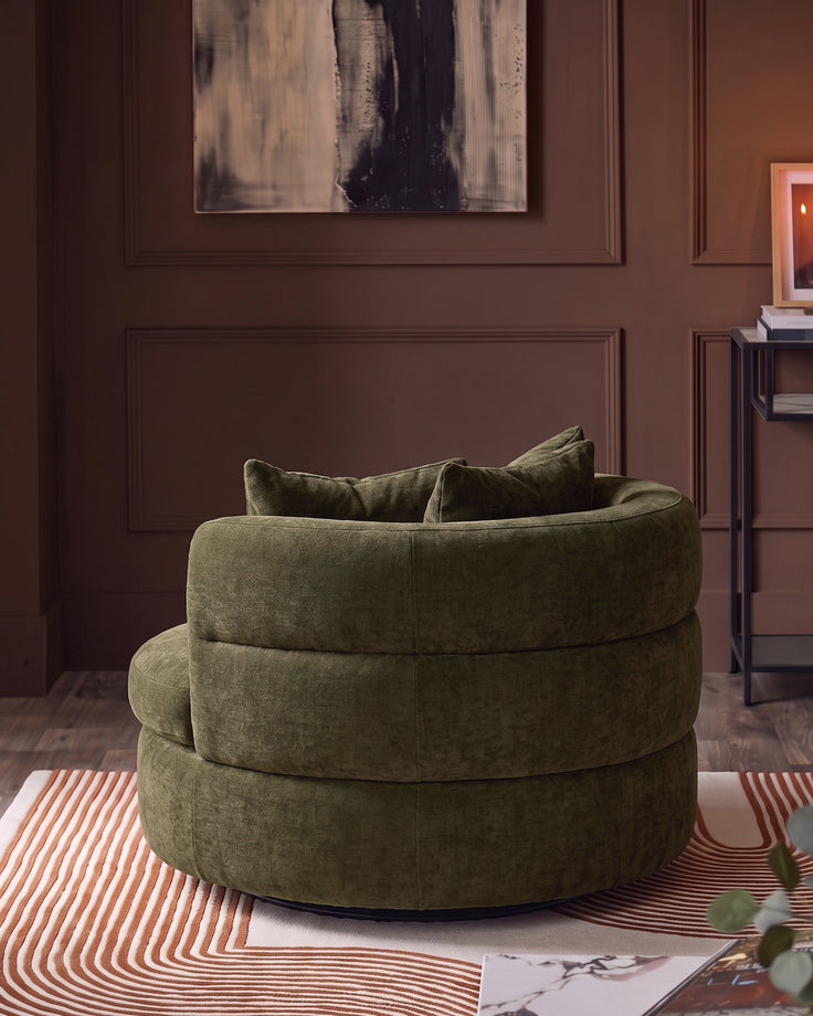 Gwen dark green chenille swivel armchair