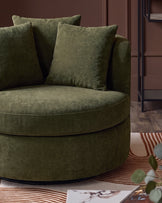 Gwen dark green chenille swivel armchair