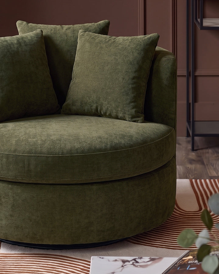 Gwen dark green chenille swivel armchair
