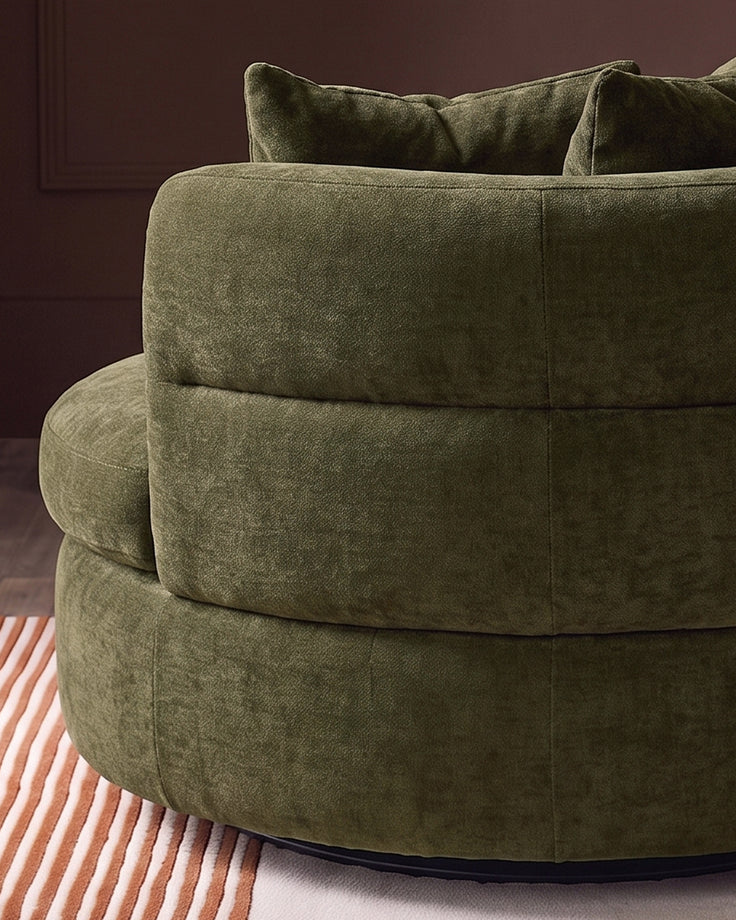 Gwen dark green chenille swivel armchair