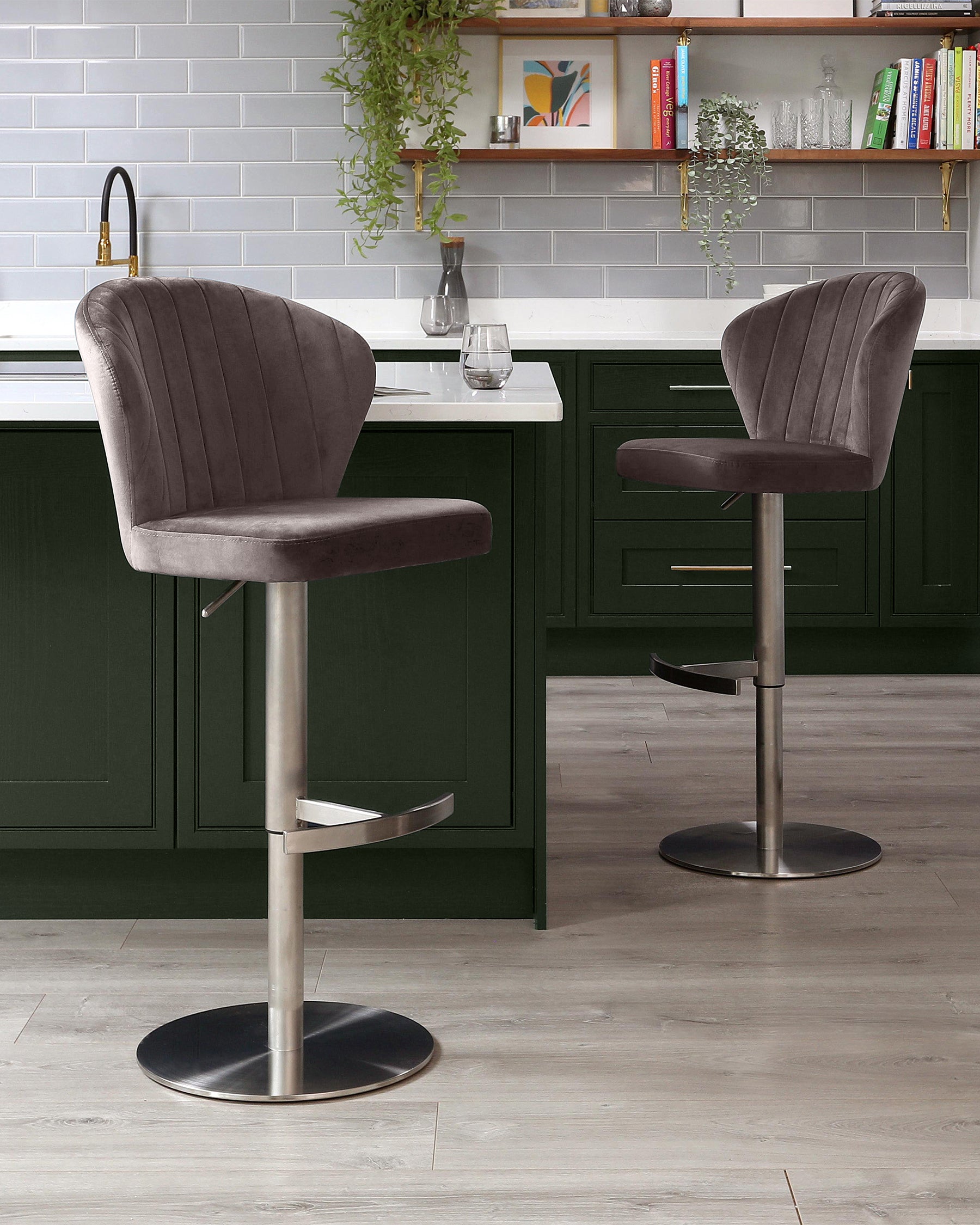 Harper mocha velvet gas lift bar stools with brushed metal bases positioned at a green kitchen island.