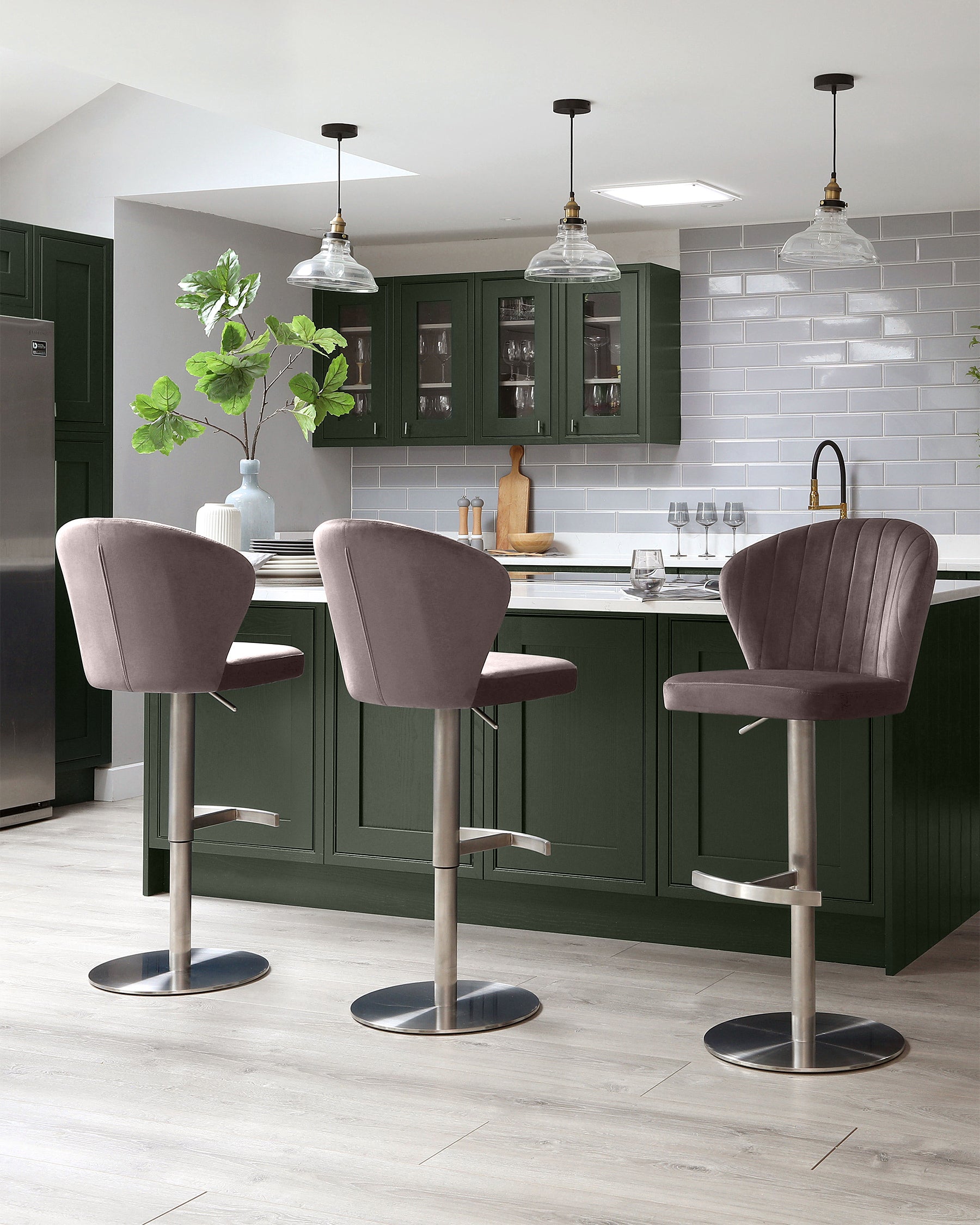 Harper velvet gas lift bar stool in mocha, shown in a modern kitchen setting at the island counter.