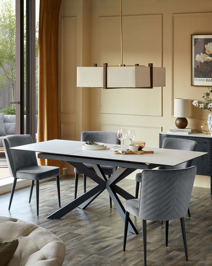 A dining room scene features a modern table and chairs, a sideboard, and an overhead light fixture.