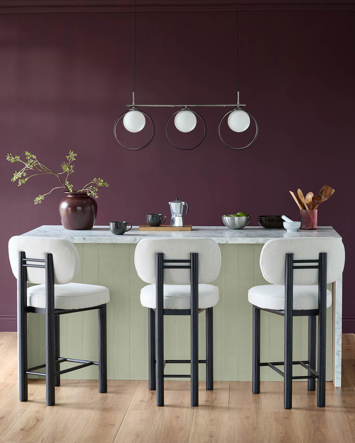 Chloe 3-pendant light with glass globes and silver chrome finish, suspended above a kitchen island.