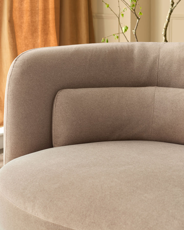 Henry 3-seater sofa in mocha fabric, curved armrest detail shown in close-up view with neutral room setting background.