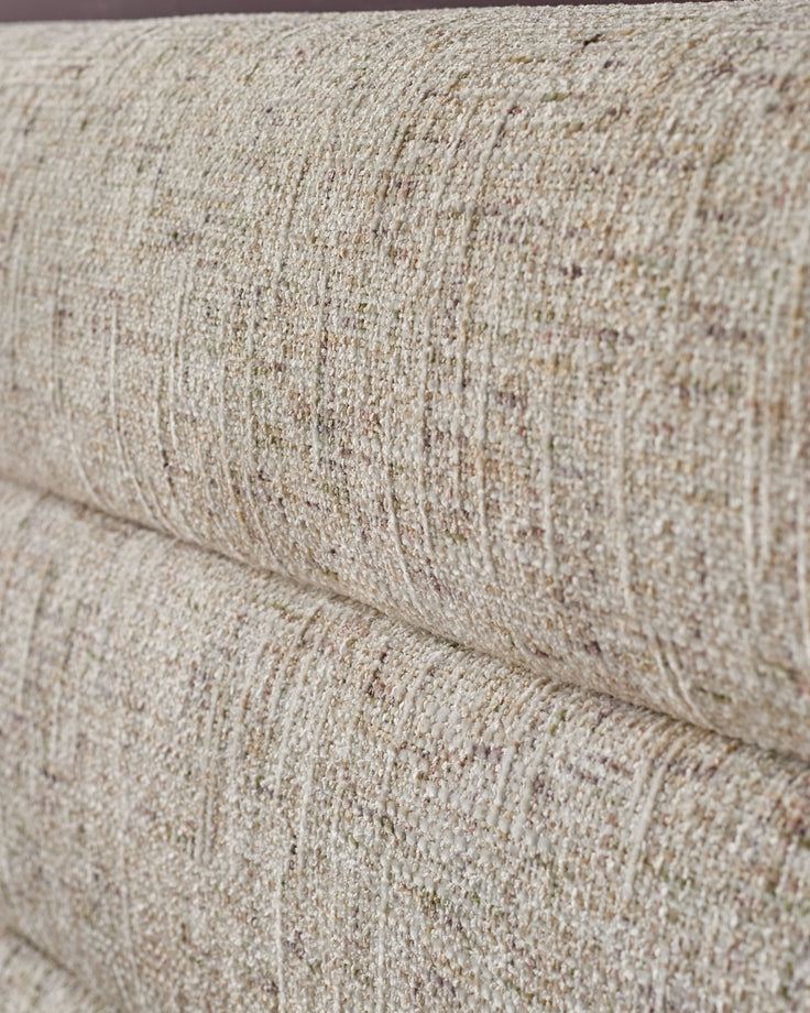Close-up of natural beige textured fabric on Hepworth king-size ottoman bed, showing weave detail and stitching.