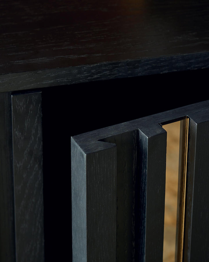 A dark wood cabinet with an open door, revealing a sleek, modern design. Perfect for stylish storage.