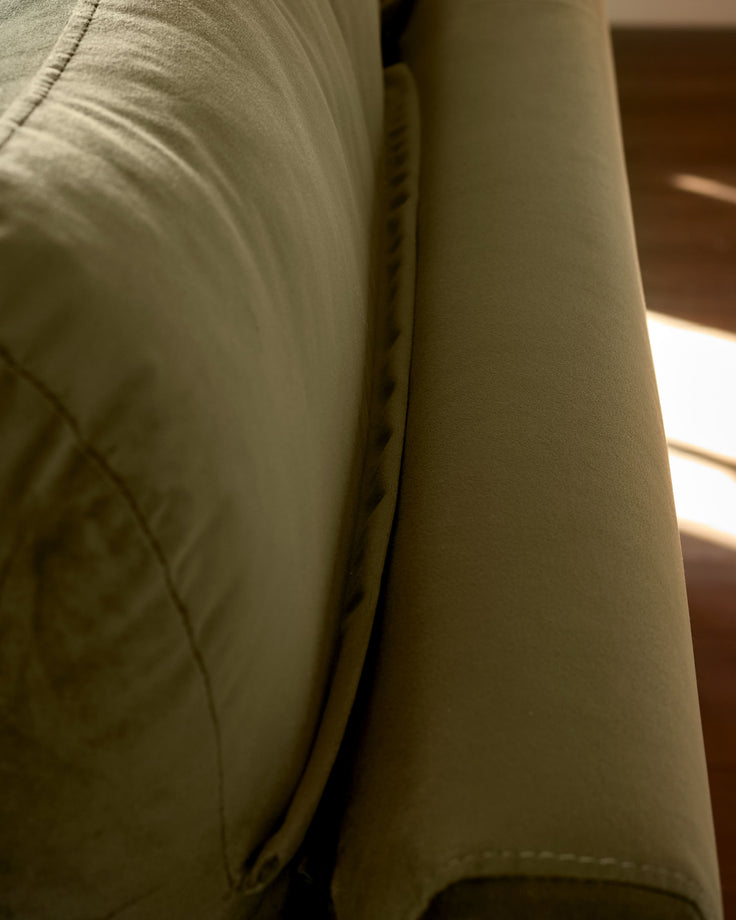Jacob 3-seater sofa in olive green velvet, close-up of arm seam detail