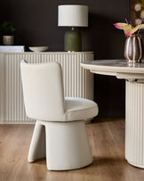 Jenna cream fabric swivel dining chair