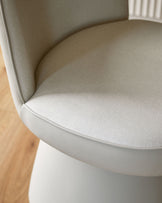 Jenna cream fabric swivel dining chair