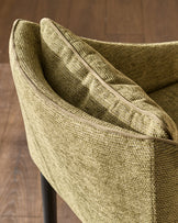 Julep bar stool in olive green fabric, close-up of curved backrest and woven texture detail.