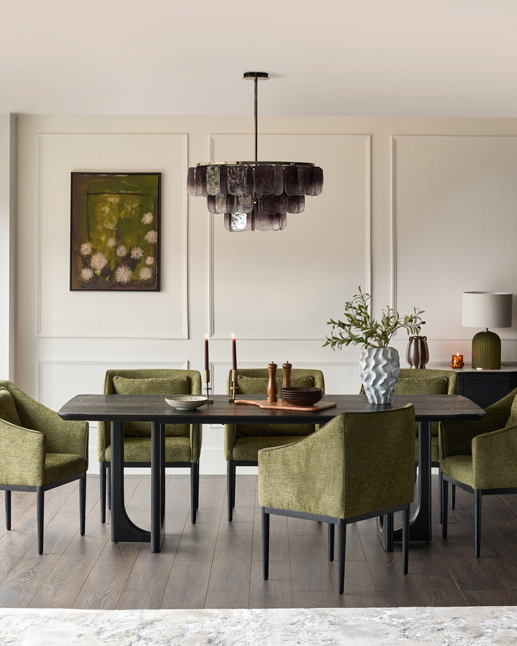Olive green Julep dining chair with upholstered seat and back, dark wooden legs, shown in modern dining room setting.