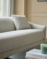 Julep Blackwood 3-seater sofa in grey fabric, shown at an angle with a matching scatter cushion.