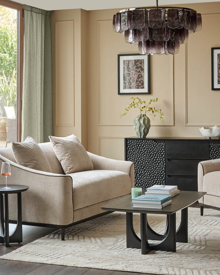 Estelle Chandelier in smoked ombre glass, featuring tiered rectangular panels in a modern living room setting.