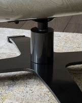 Karma dark grey leather swivel recliner accent chair and footstool