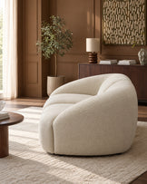 Kimberley 3-seater sofa in natural fabric with curved, rounded silhouette in a warm brown room setting.