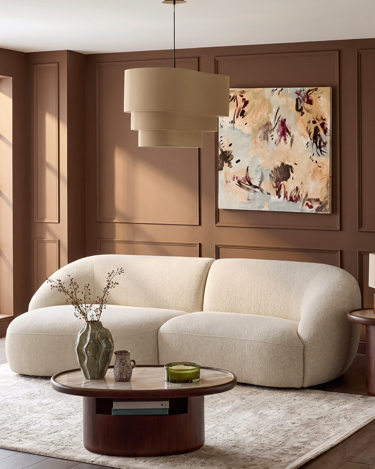 Kimberley left-hand chaise 3-seater sofa in natural fabric, displayed in a warm brown interior with curved silhouette.