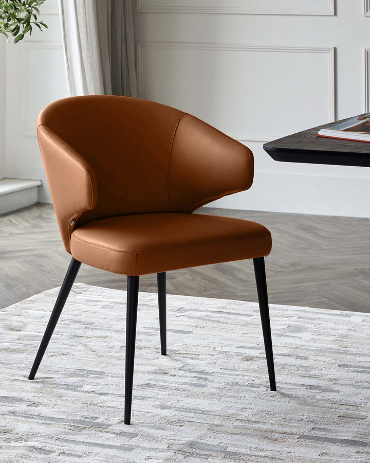 Tan leather dining chair with curved back, black metal legs, shown at an angle in a modern office setting.