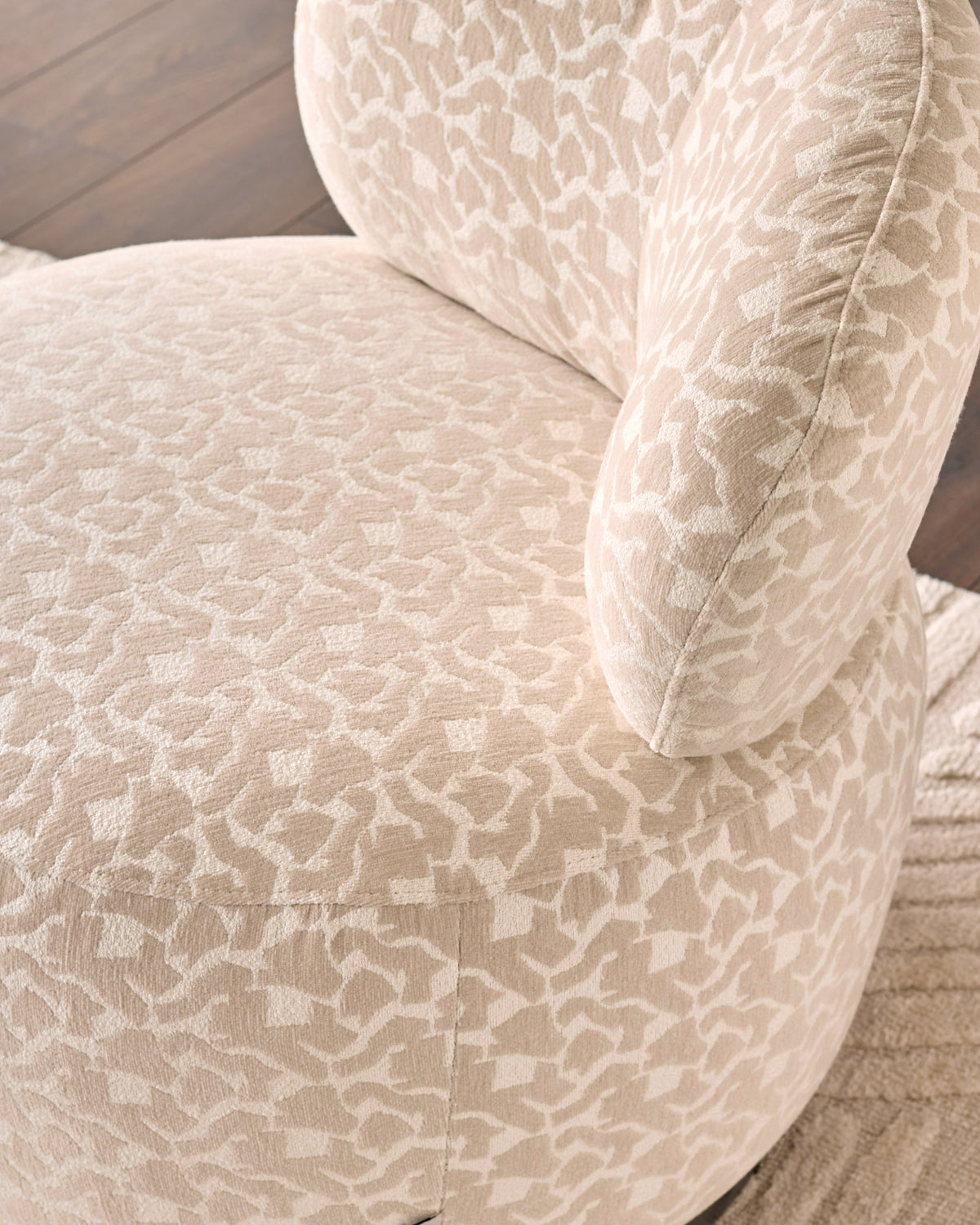 Leda champagne abstract fabric swivel accent chair