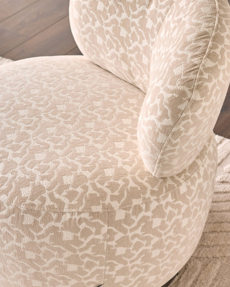 Leda champagne abstract fabric swivel accent chair