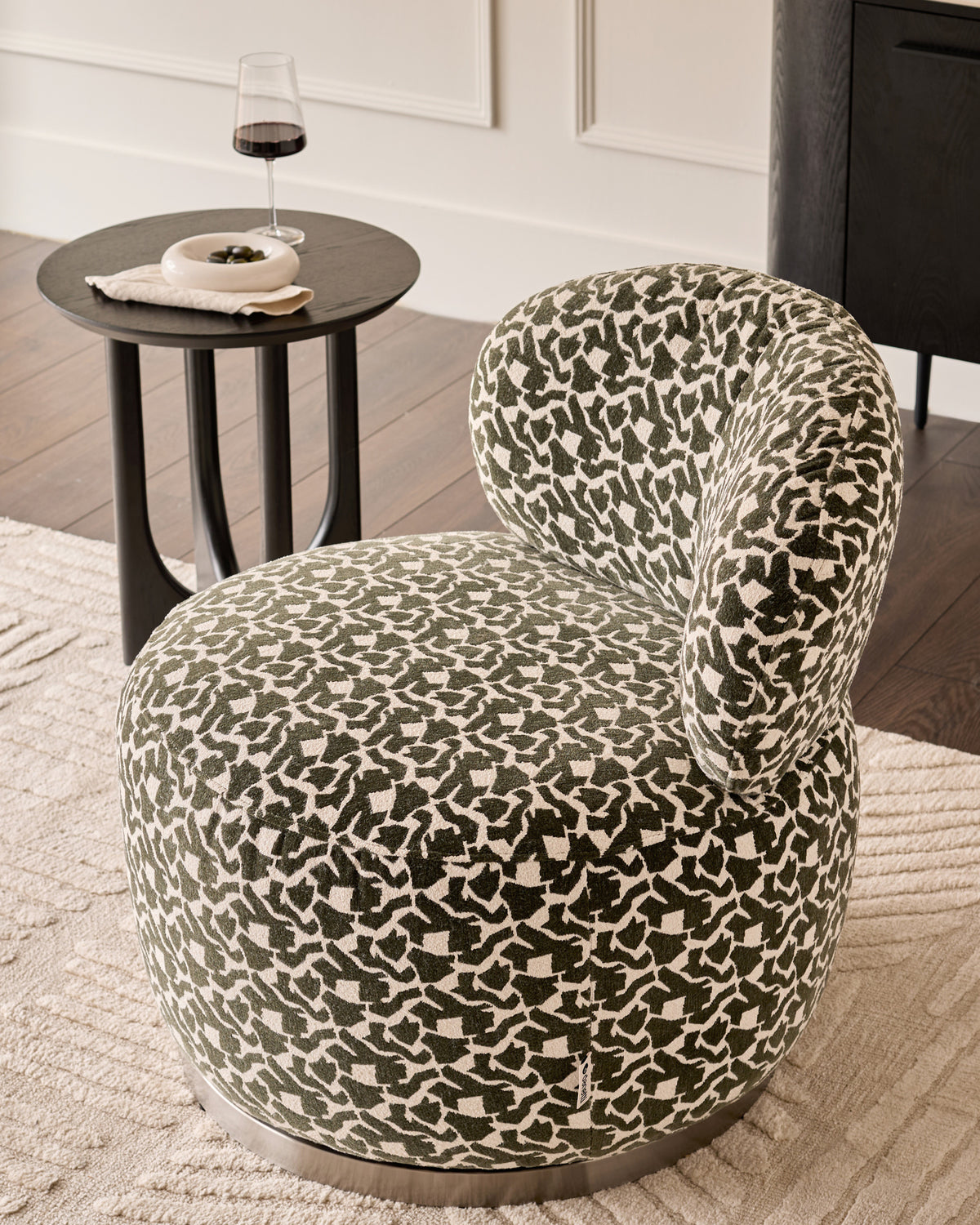 Leda dark green abstract fabric swivel accent chair