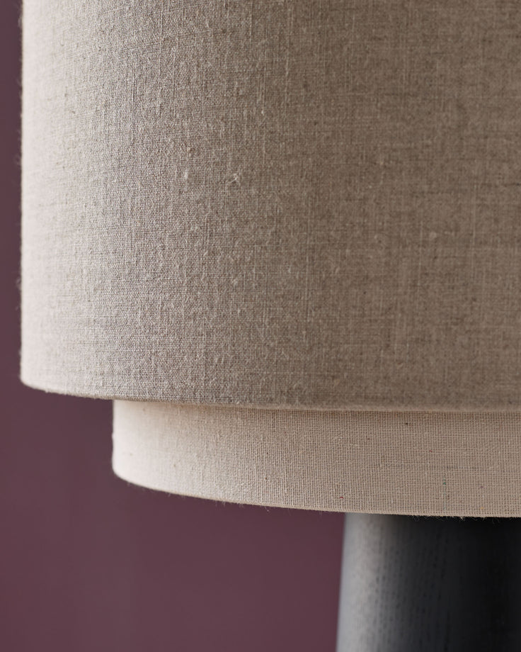 Leonie table lamp with natural linen shade and mocha base, close-up detail view.