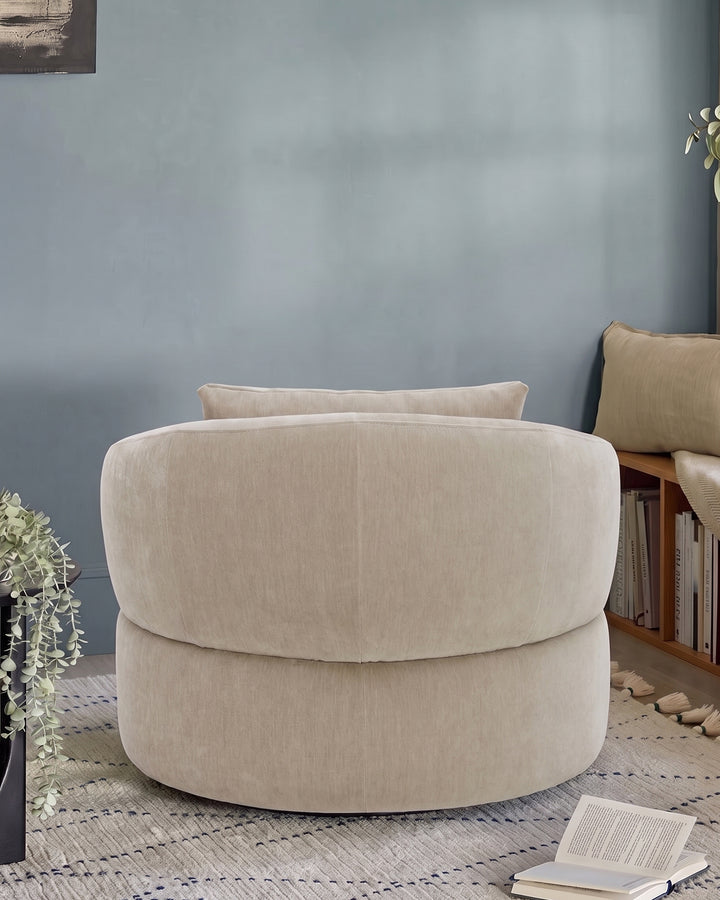 Lia champagne chenille swivel armchair