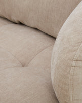 Lia champagne chenille swivel armchair