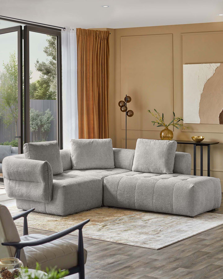 Lillian right small corner sofa in light grey weave, L-shaped design with quilted seat and cushioned armrests in modern living room.