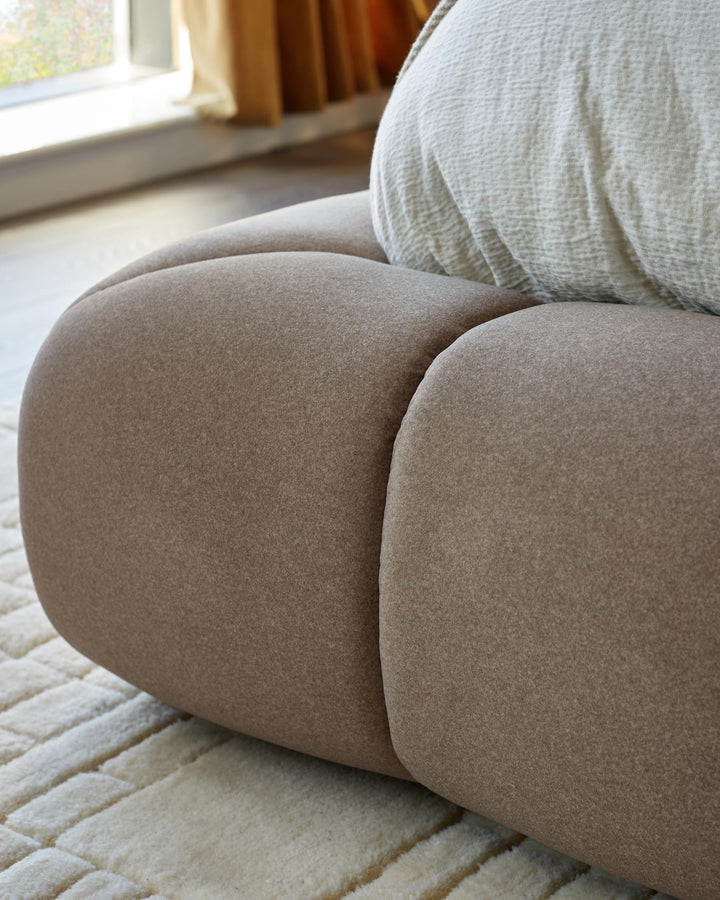 Stylish modular sofa in neutral tones. Perfect for creating a relaxing and modern living space.