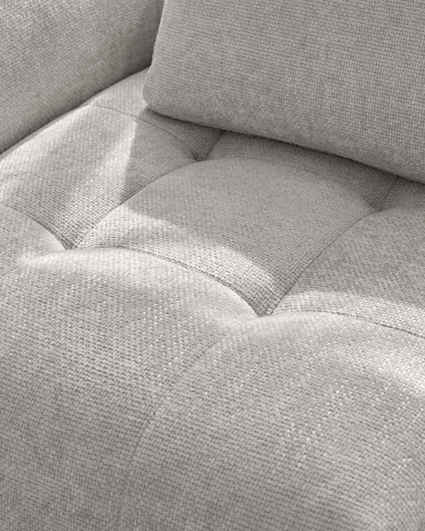 Close-up of light grey weave fabric on Lillian single module sofa, showing cushion texture and seaming detail.