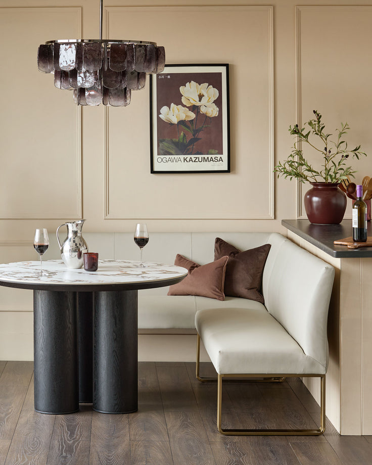 Loop 5-seater right-hand corner dining bench in light grey faux leather with brushed brass legs, displayed in dining room setting.