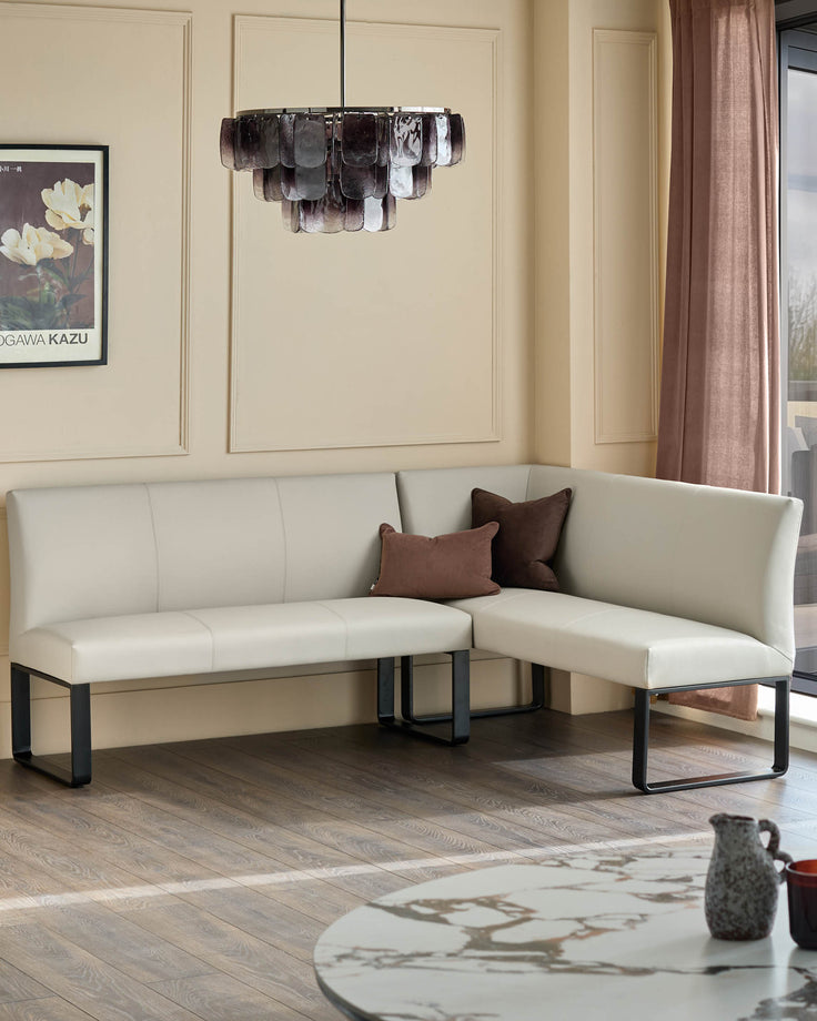 Loop 5-seater left-hand corner bench with light grey upholstery and black metal legs, styled in a modern living room.