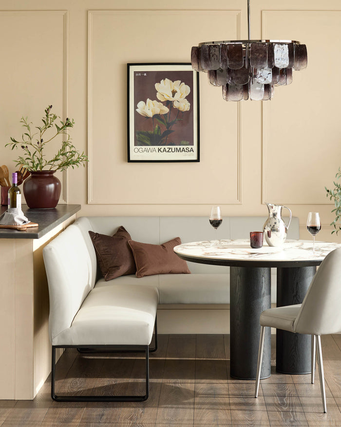 Light grey left-hand corner bench with black metal legs, displayed in an elegant dining setting.