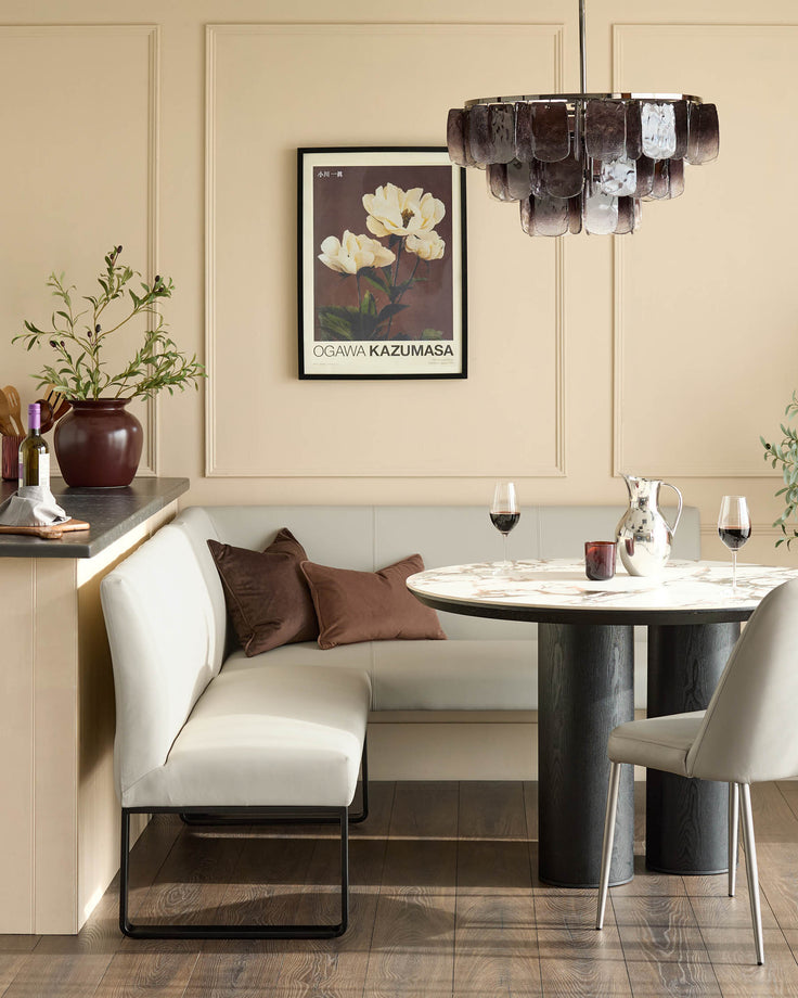 Light grey left-hand corner bench with black metal legs, displayed in an elegant dining setting.