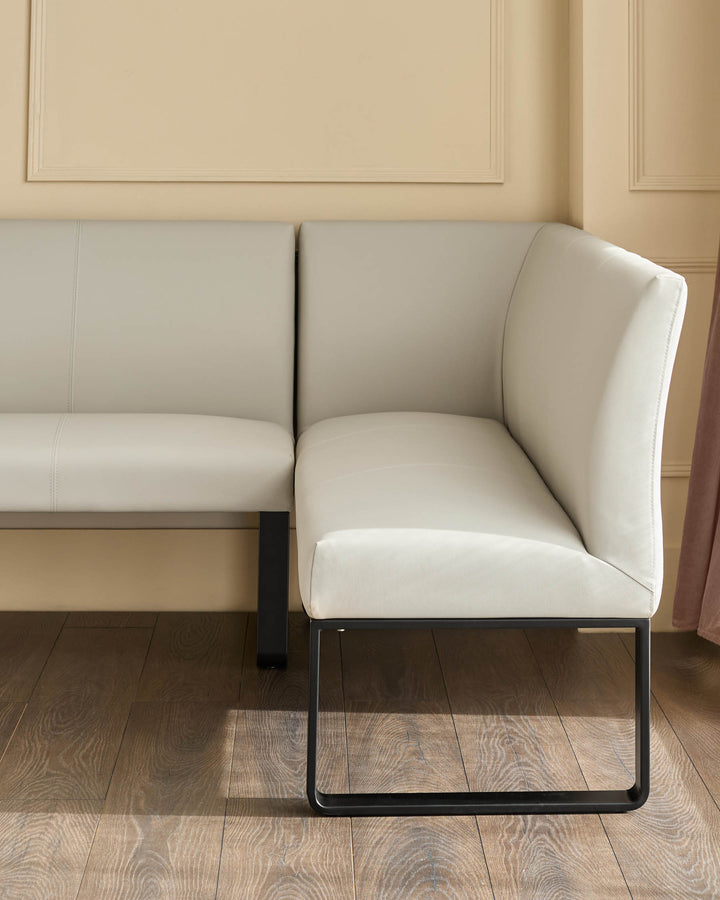 Light grey corner bench with black metal legs, showing right-hand seat section in modern minimalist interior.