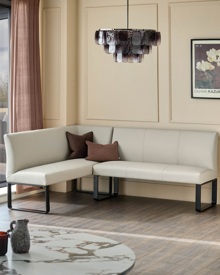 Light grey 5-seater corner bench with black metal legs, shown in modern living room setting.