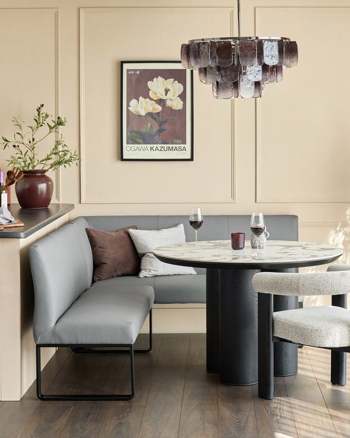 Loop 5-seater left-hand corner bench in mid-grey with black legs, shown in modern dining setting.