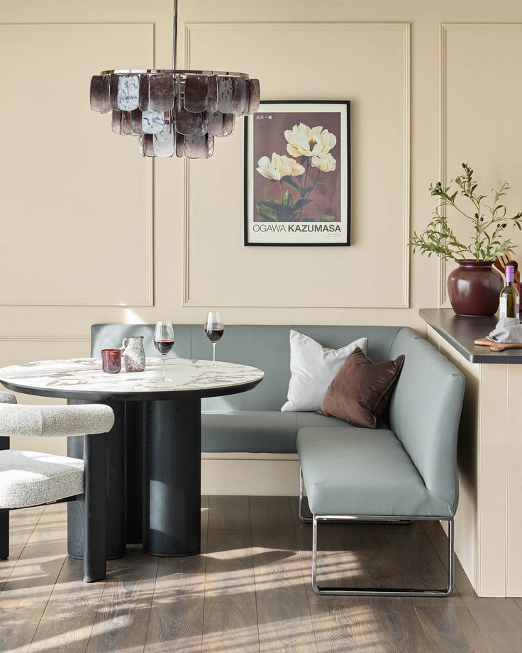 Loop 5-seater right-hand corner dining bench in mid-grey faux leather with chrome legs, styled in modern dining setting.