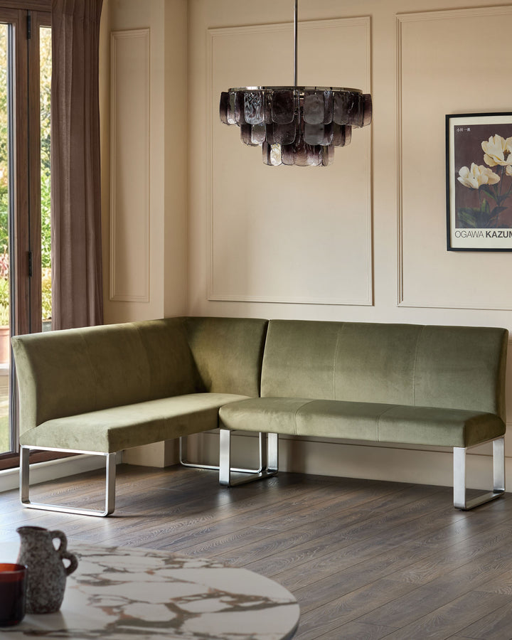 Loop 5-seater right-hand corner bench with olive green upholstery and stainless steel legs in modern living room setting.