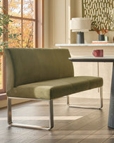 Loop 3-seater velvet bench with backrest in olive green, stainless steel frame, shown in modern living room setting.