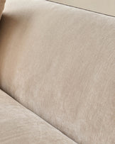 Champagne fabric detail of Julep Blackwood 2-seater sofa, showing soft upholstery texture and seam.