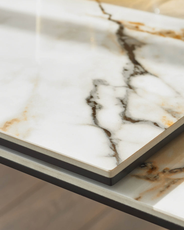 Close-up of marble-effect tabletop, highlighting stylish design. Durable, modern furniture ideal for any home.